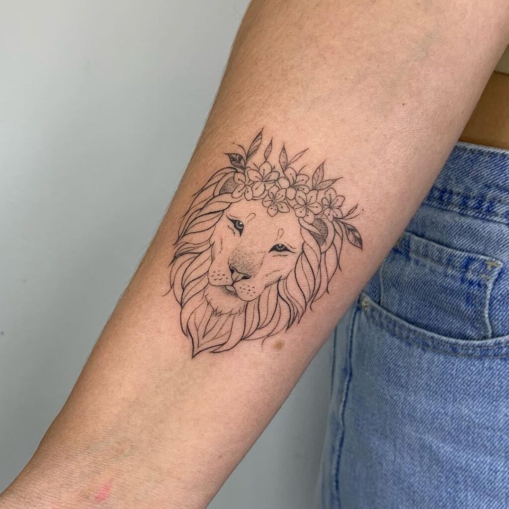 Tatuagem no braço leao feminino