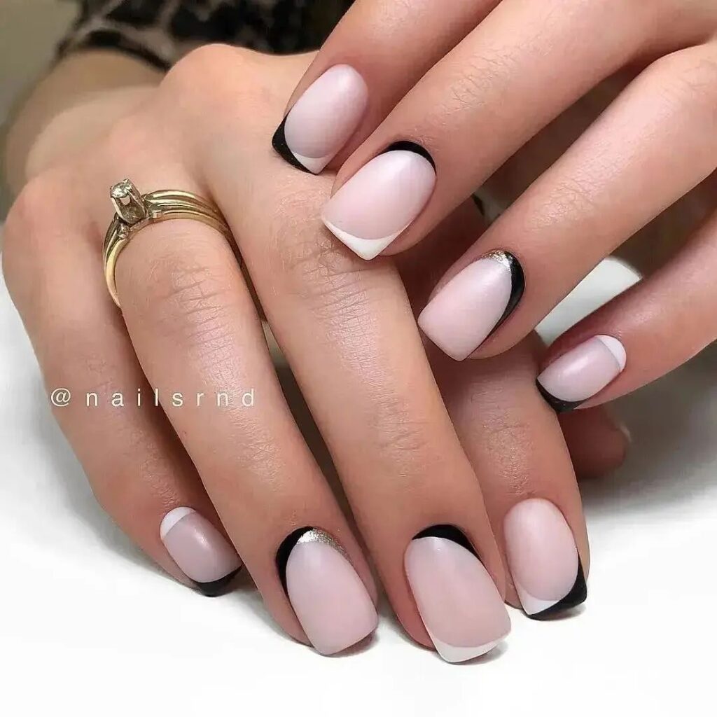 unhas pretas com branco