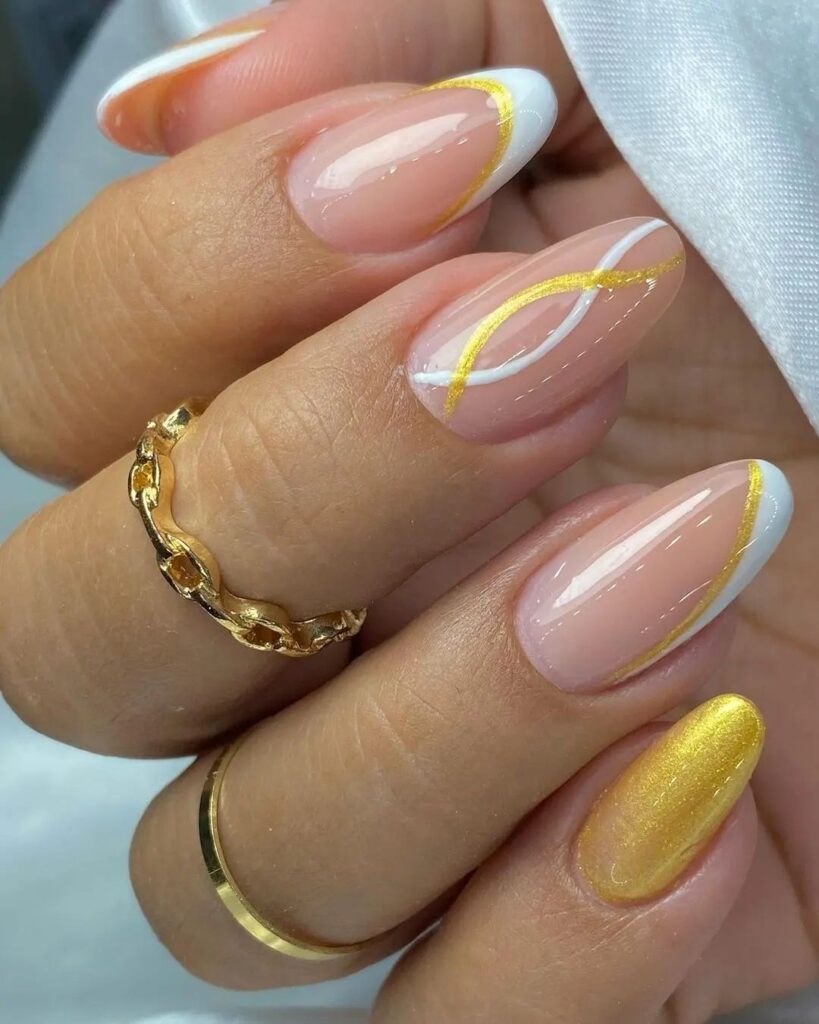 nails decoradas branco com dourado